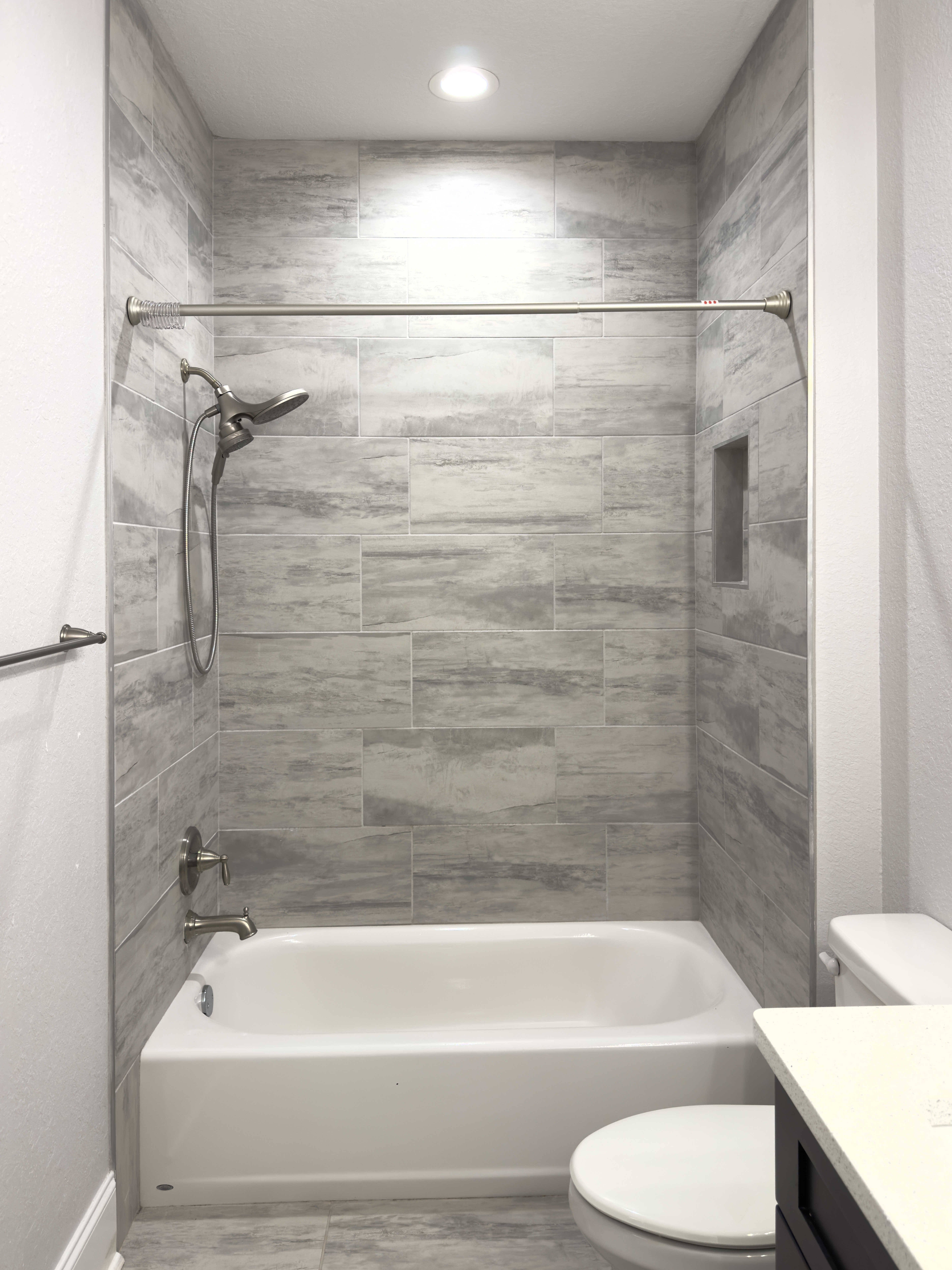 Bathroom tub and shower surround